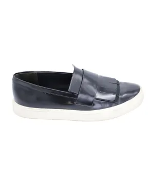 Vince Conventry Kiltie Fringe Slip-On Sneakers in Black Leather