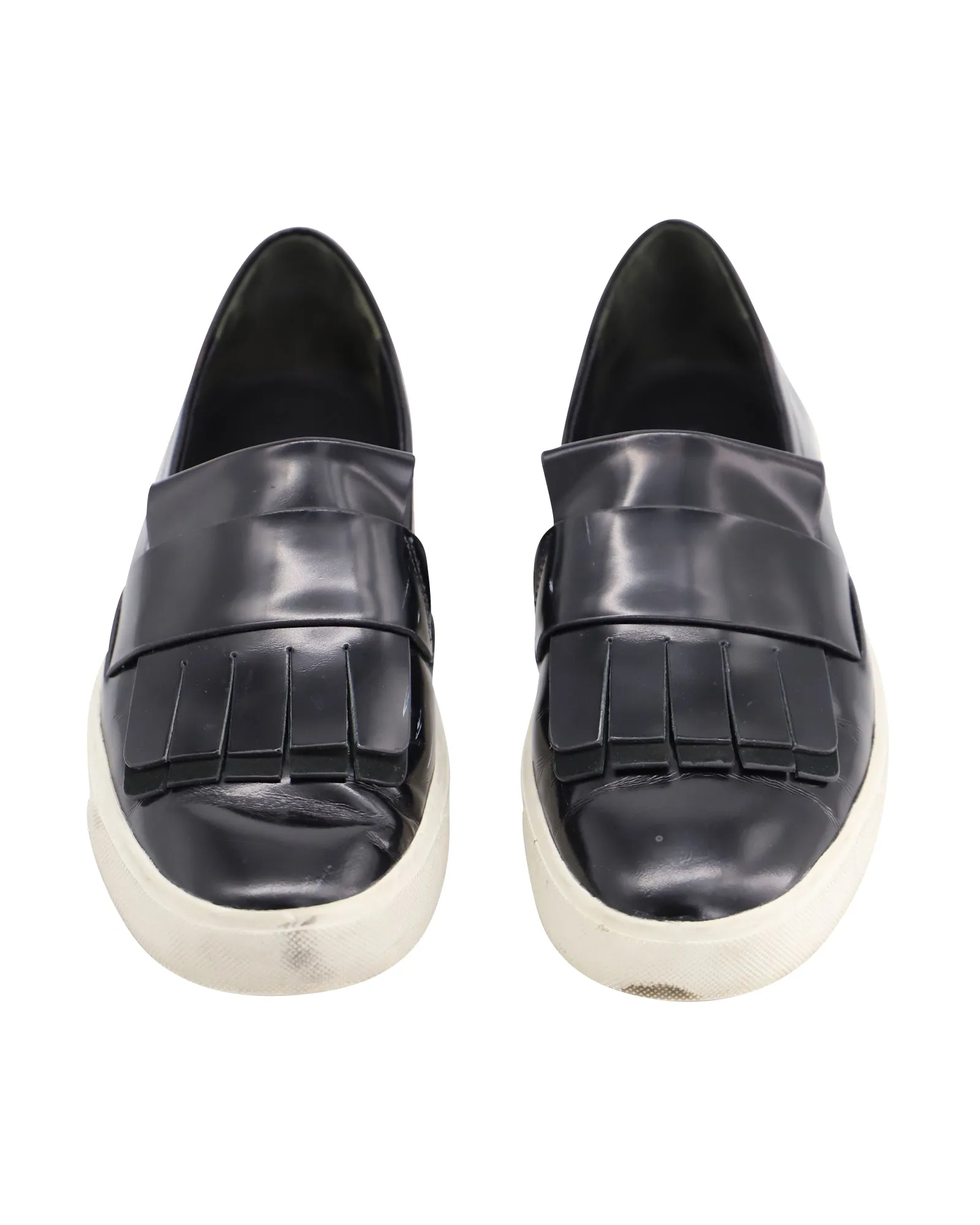 Vince Conventry Kiltie Fringe Slip-On Sneakers in Black Leather