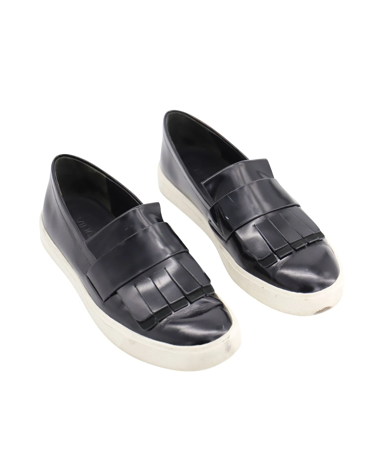 Vince Conventry Kiltie Fringe Slip-On Sneakers in Black Leather