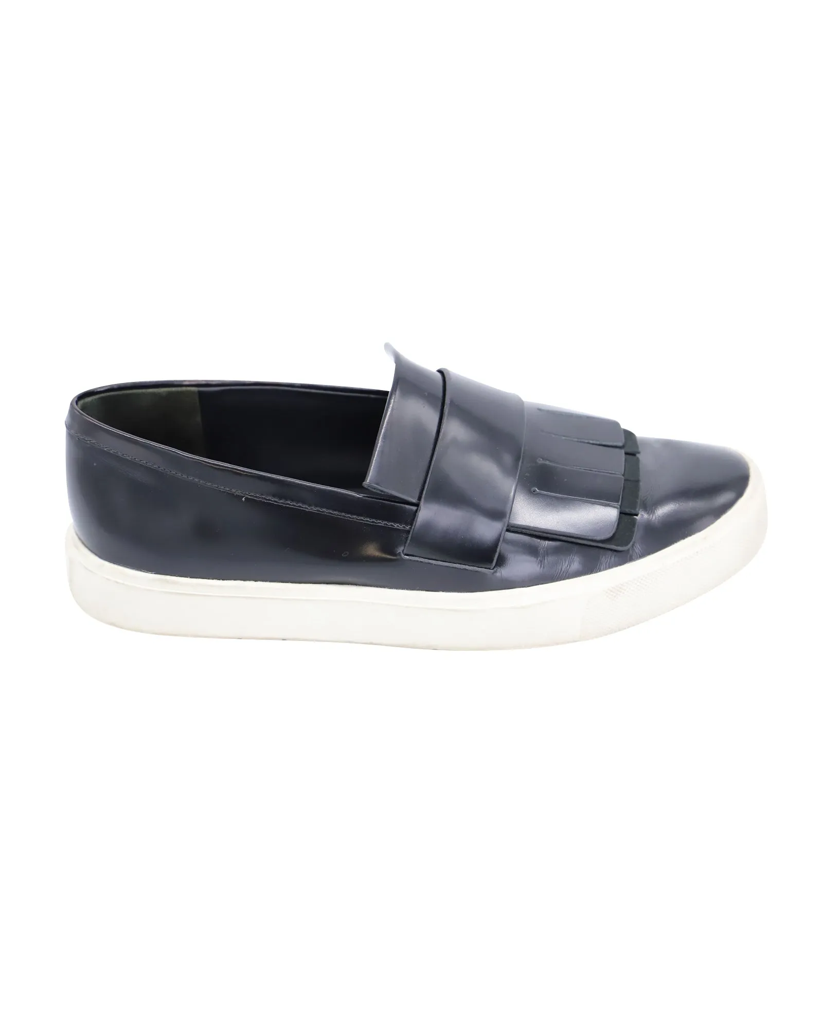 Vince Conventry Kiltie Fringe Slip-On Sneakers in Black Leather